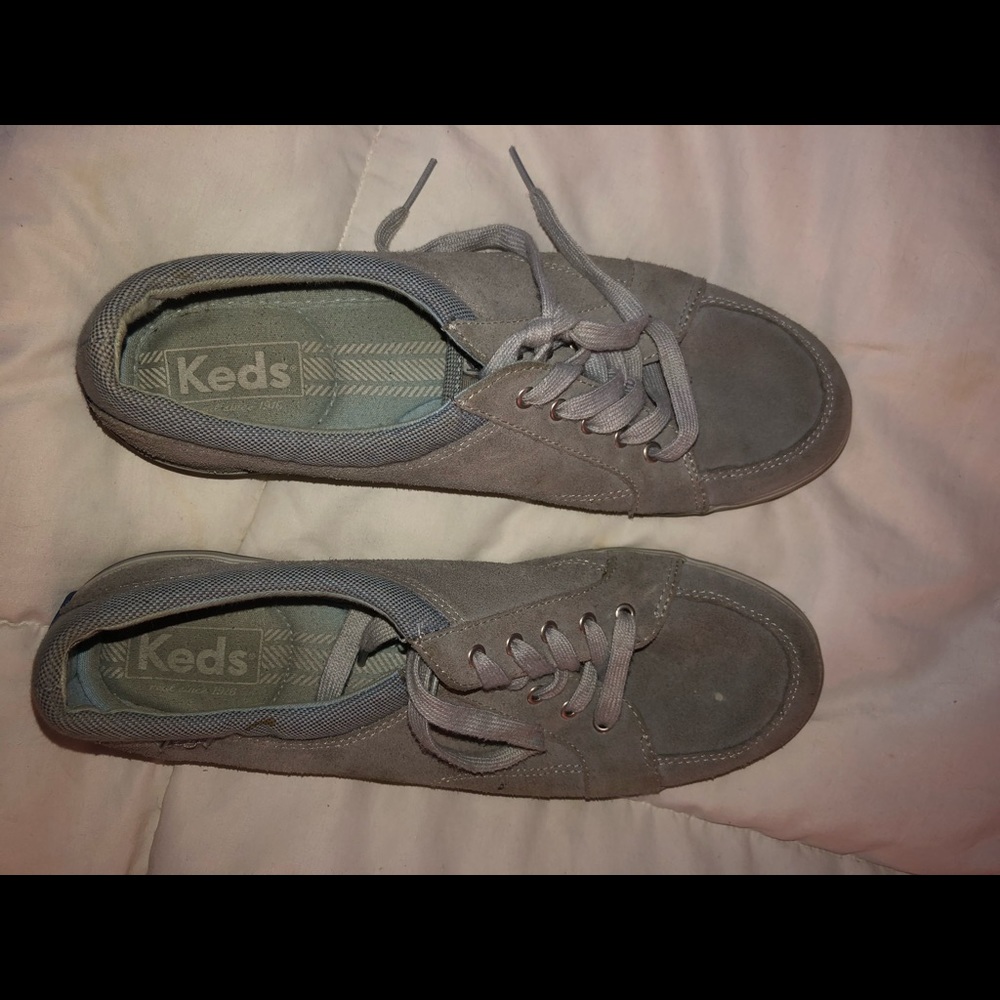 Well worn Keds tennis shoes